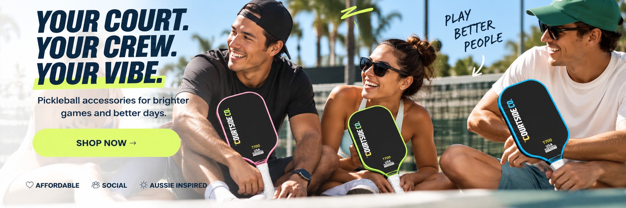 COURTSIDE CO. friends holding pink, lime and blue branded paddles